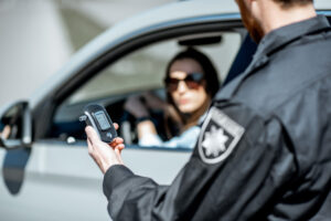 Police officer stands near woman’s car and informs her that her blood alcohol registered above a .08