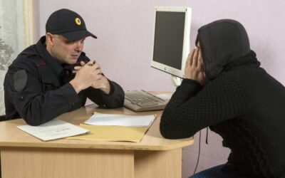 A probation officer explains the consequences of violating formal probation in California to an offender. If this was informal probation, this would be done in a courtroom.